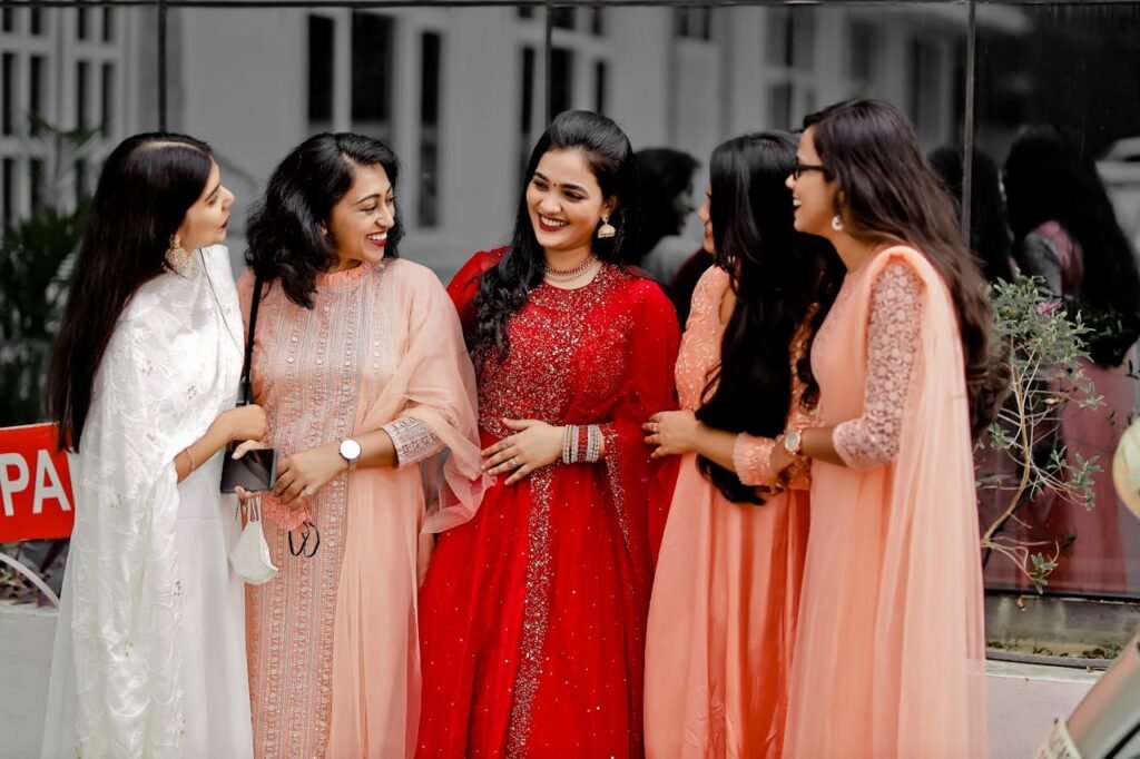 Smiling Women in Traditional Dresses